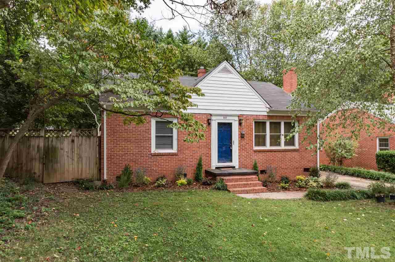 507 Brooks Avenue Raleigh, NC 27607 - Photo 1 of 20 a front view of house with yard and trees in the background