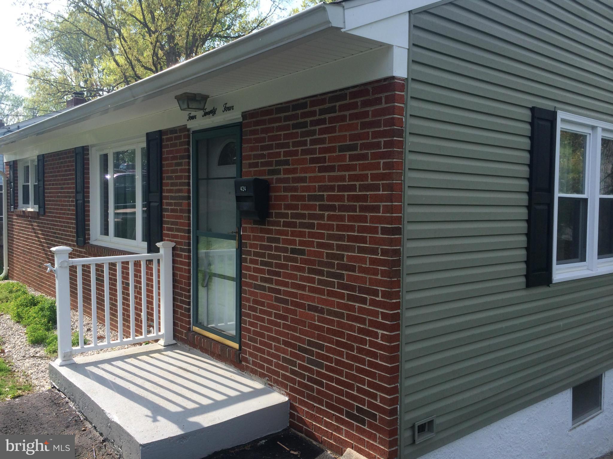 424 West Maple Road Linthicum, MD 21090 - Photo 2 of 24 a view of a backyard with a deck