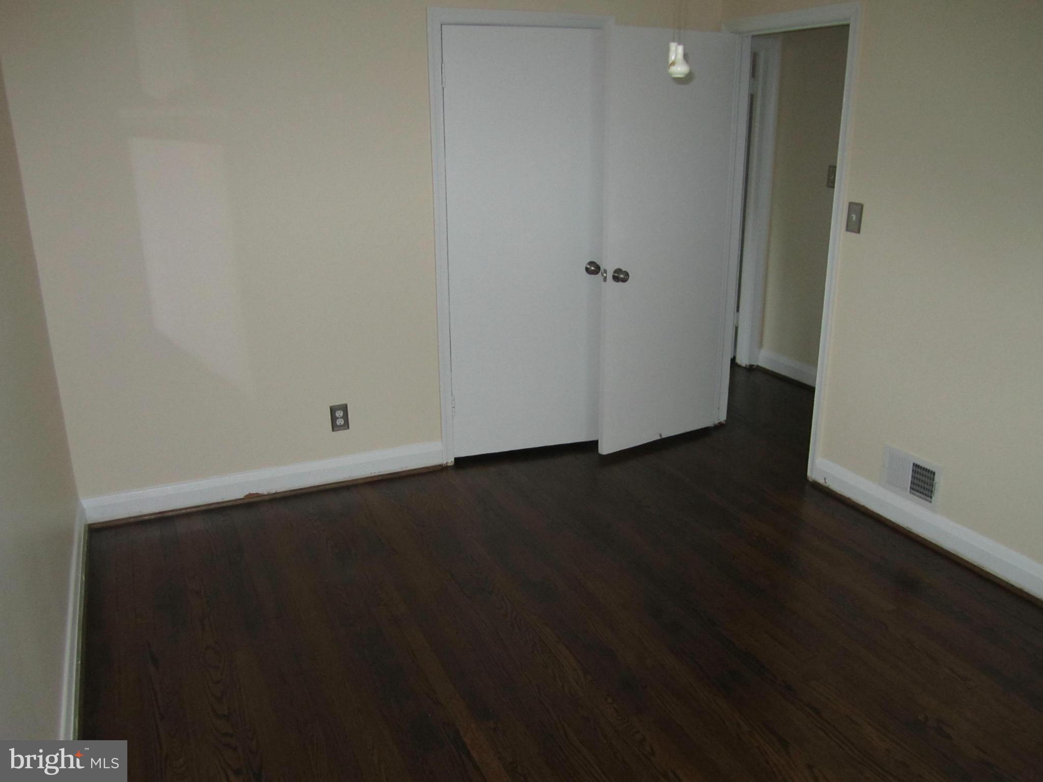 424 West Maple Road Linthicum, MD 21090 - Photo 13 of 24 an empty room with wooden floor
