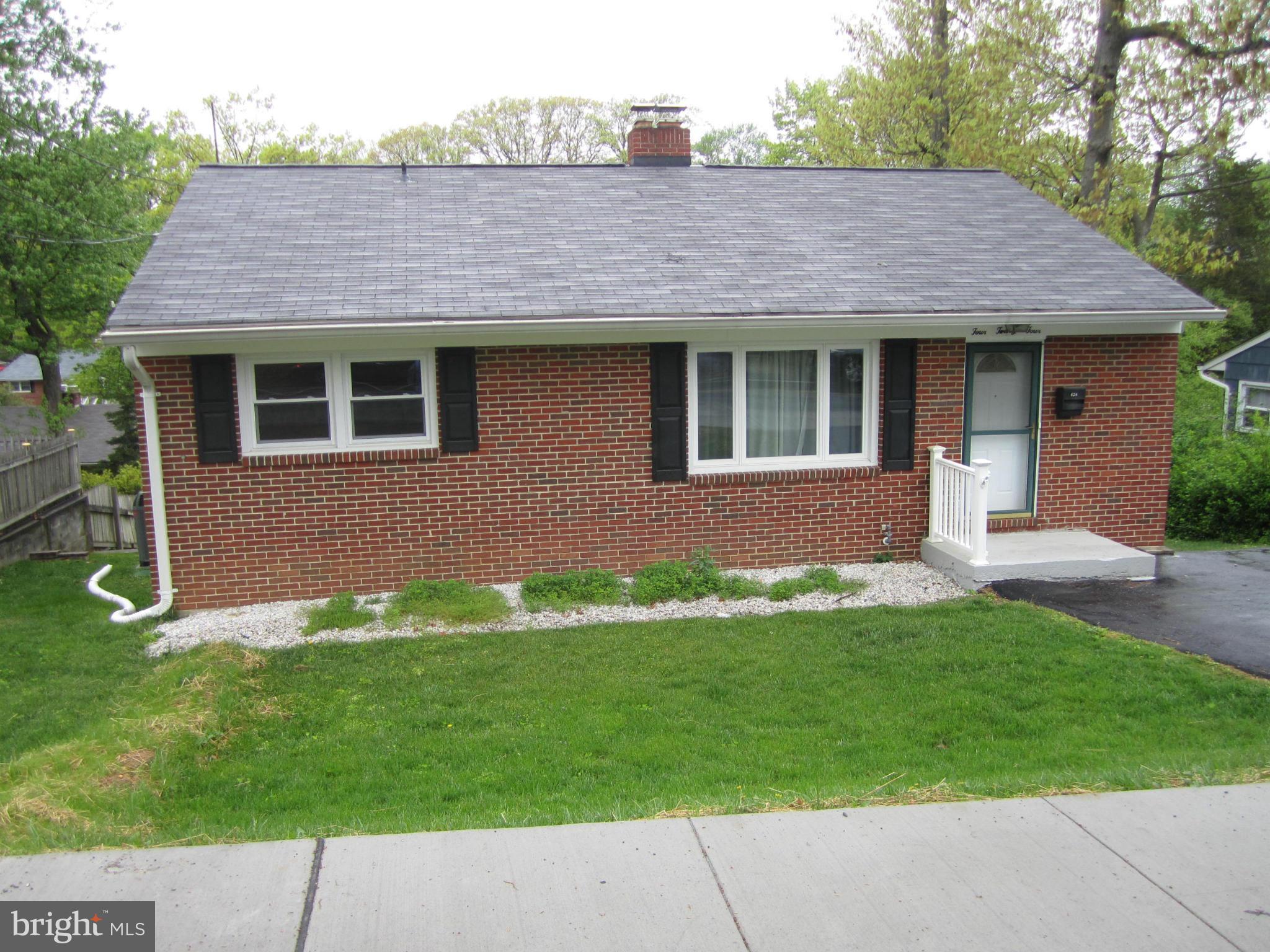 424 West Maple Road Linthicum, MD 21090 - Photo 3 of 24 a front view of a house with a yard