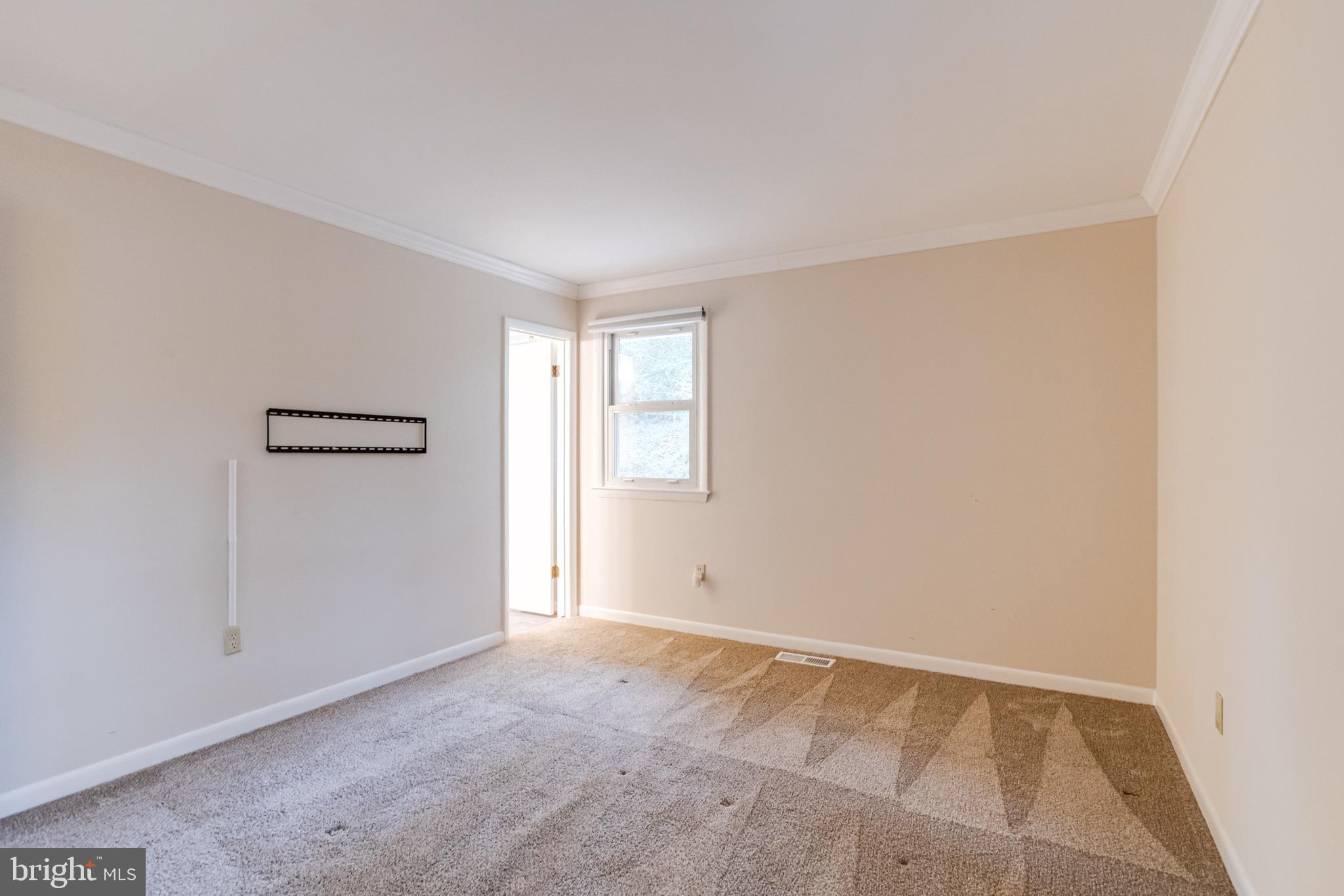 795 Windgate Drive Annapolis, MD 21409 - Photo 17 of 61 an empty room with windows and closet