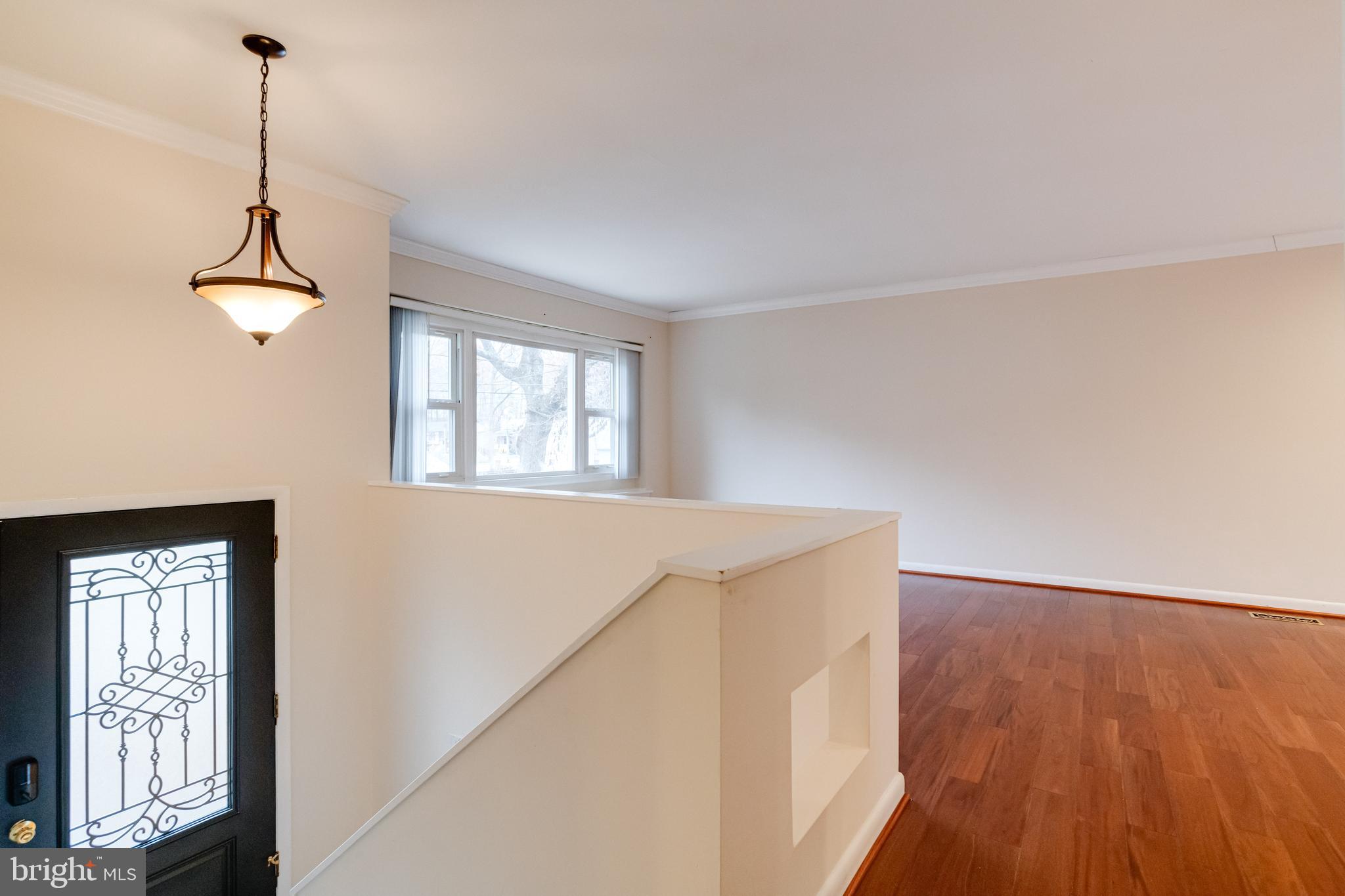 795 Windgate Drive Annapolis, MD 21409 - Photo 18 of 61 a view of an empty room with windows