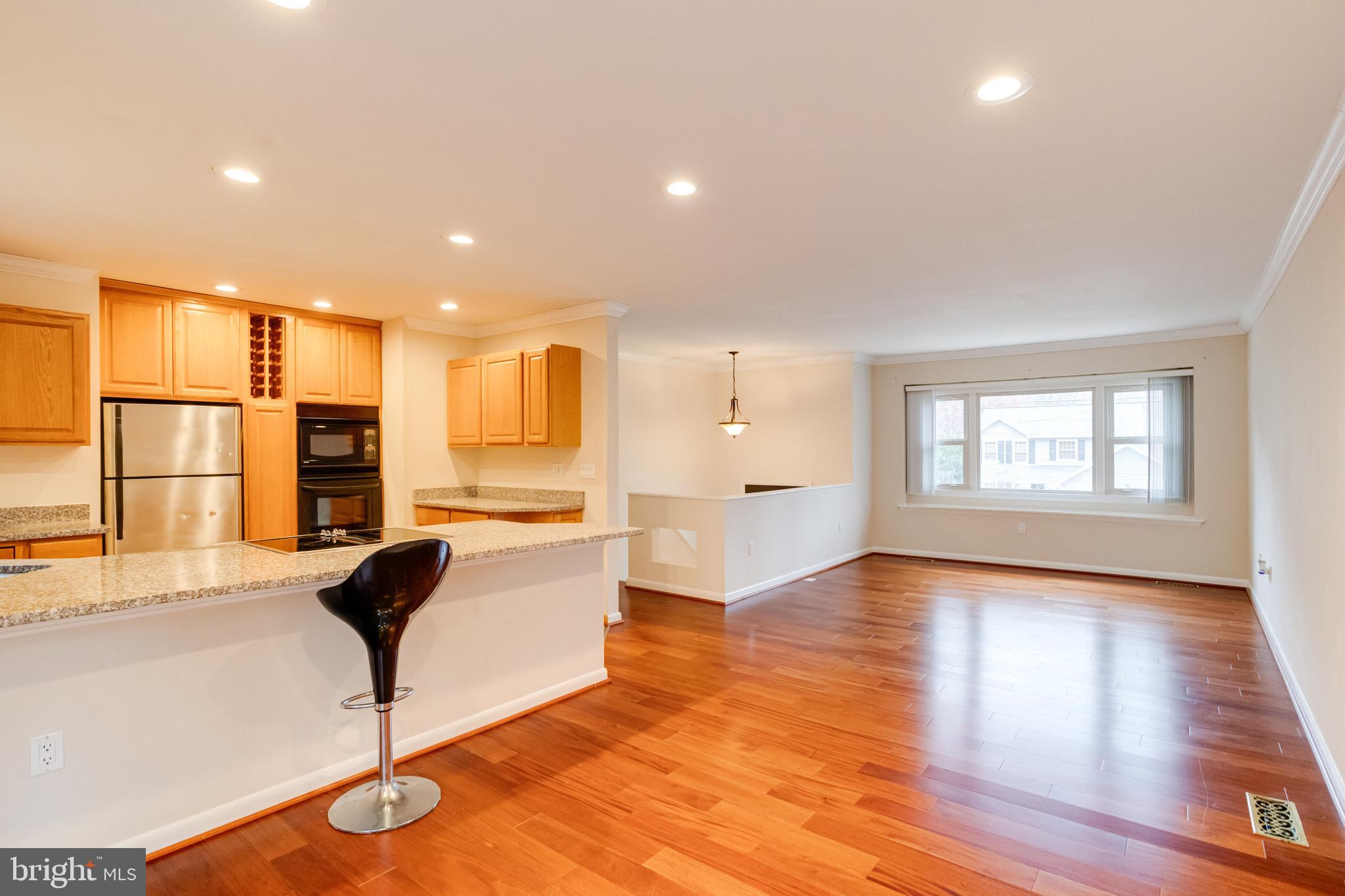 795 Windgate Drive Annapolis, MD 21409 - Photo 5 of 61 a view of kitchen with stainless steel appliances refrigerator stove and wooden floor