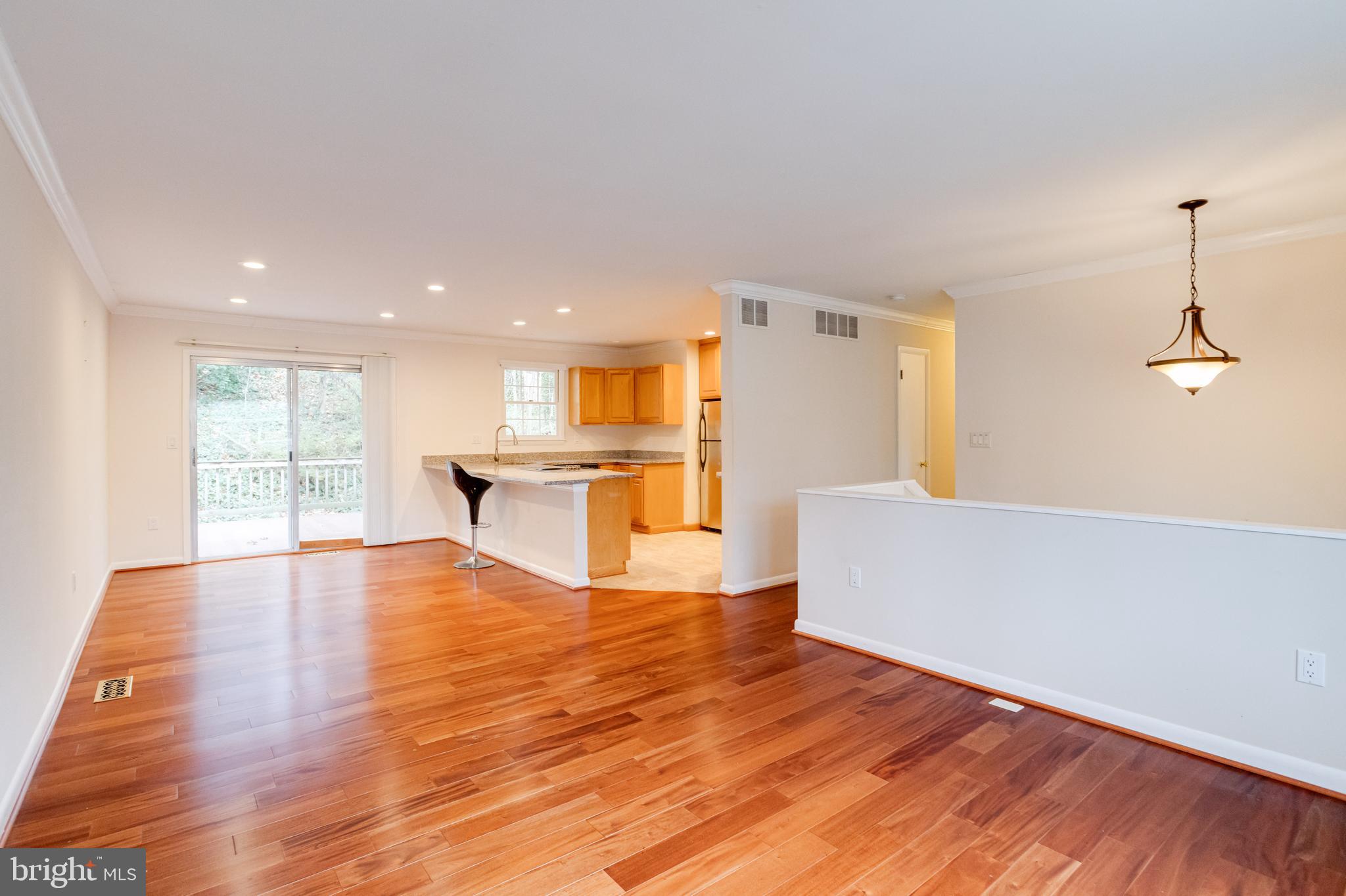 795 Windgate Drive Annapolis, MD 21409 - Photo 7 of 61 a view of kitchen with furniture and wooden floor