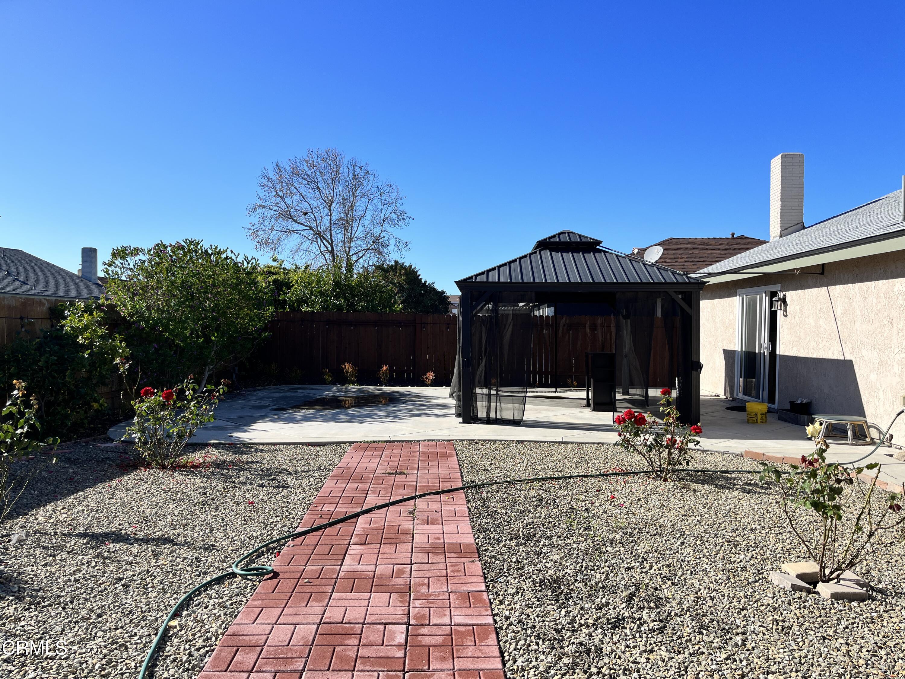 3540 Regatta Place Oxnard, CA 93035 - Photo 13 of 17 a front view of a house with garden