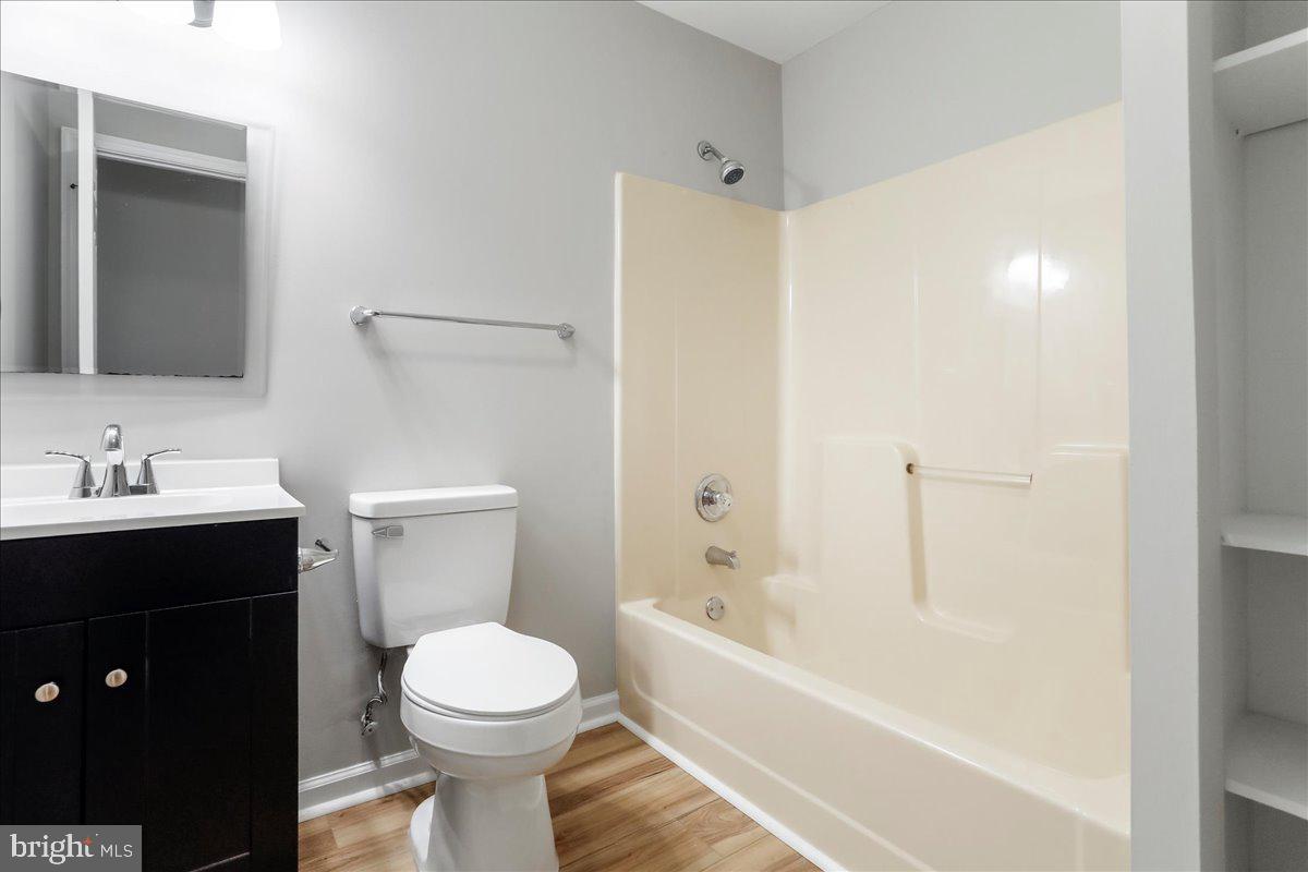 72 Pioneer Lane Berkeley Springs, WV 25411 - Photo 21 of 35 a bathroom with a sink toilet and shower