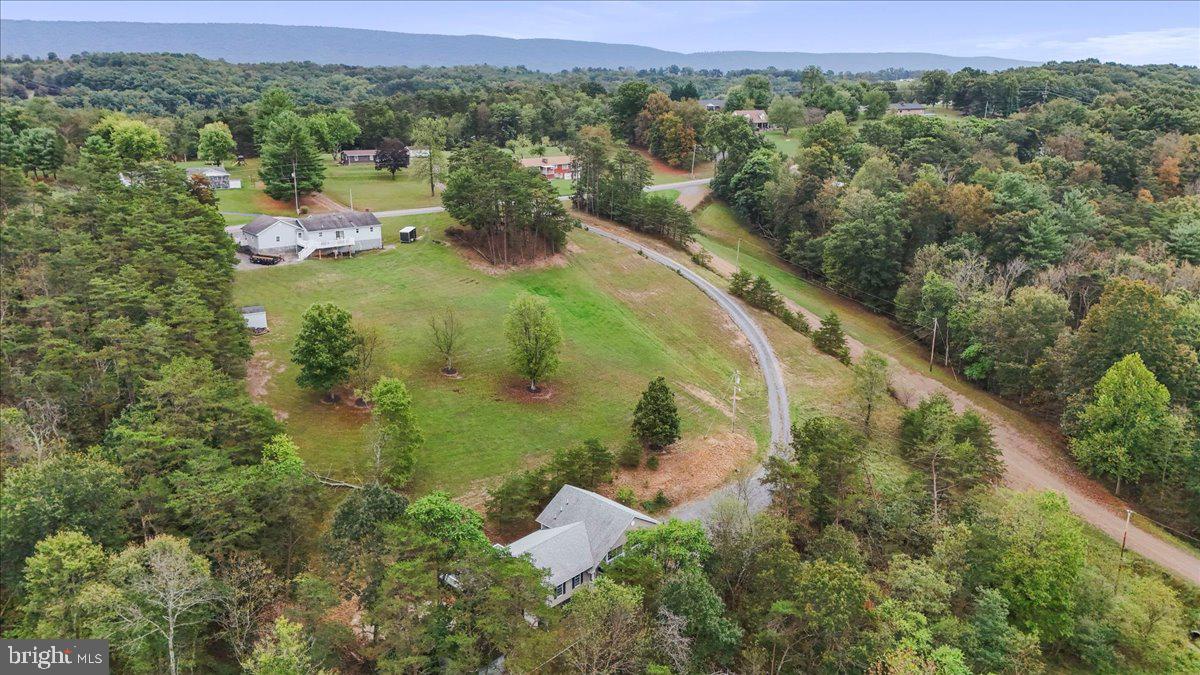 72 Pioneer Lane Berkeley Springs, WV 25411 - Photo 32 of 35 an aerial view of residential houses with outdoor space and trees