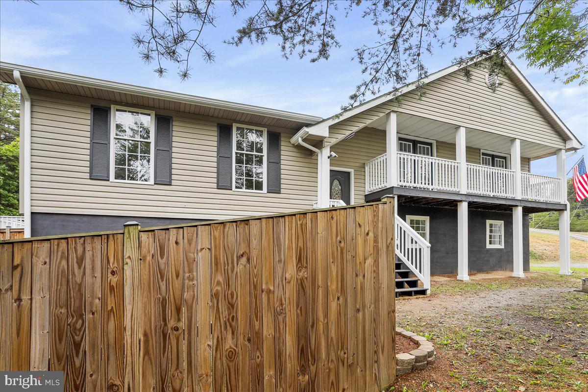72 Pioneer Lane Berkeley Springs, WV 25411 - Photo 35 of 35 a view of a house with a balcony
