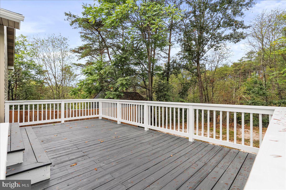 72 Pioneer Lane Berkeley Springs, WV 25411 - Photo 4 of 35 a view of deck with wooden floor and fence