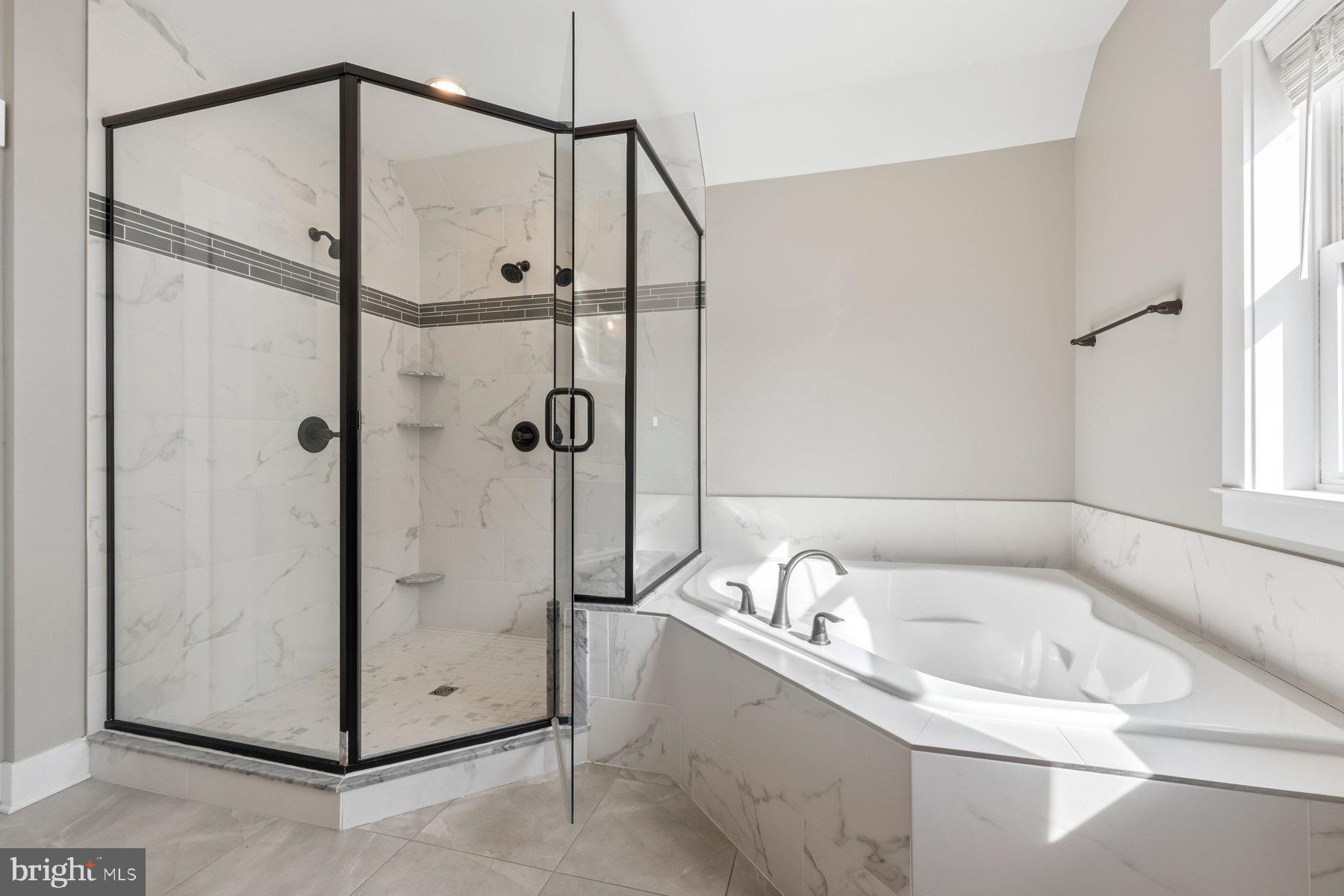6724 Hemlock Point Road New Market, MD 21774 - Photo 17 of 51 Luxury primary bathroom with stunning shower.
