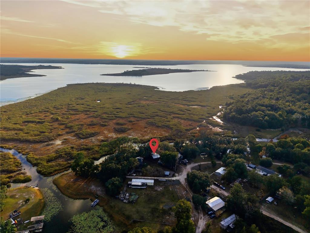 23422 Northeast 154th Place Road Salt Springs, FL 32134 - Photo 24 of 29 a view of an ocean and a mountain