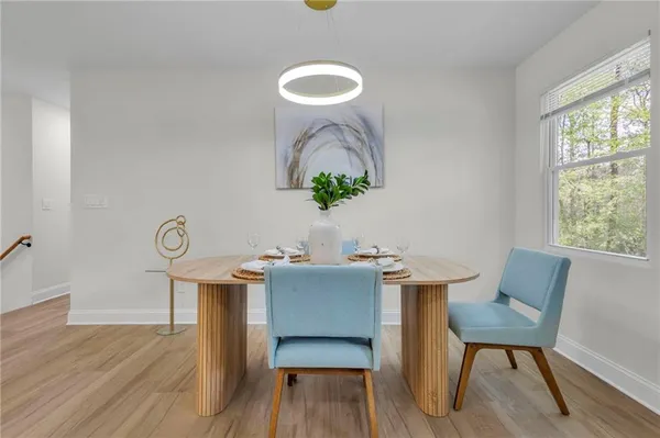 a view of a hallway with a chandelier