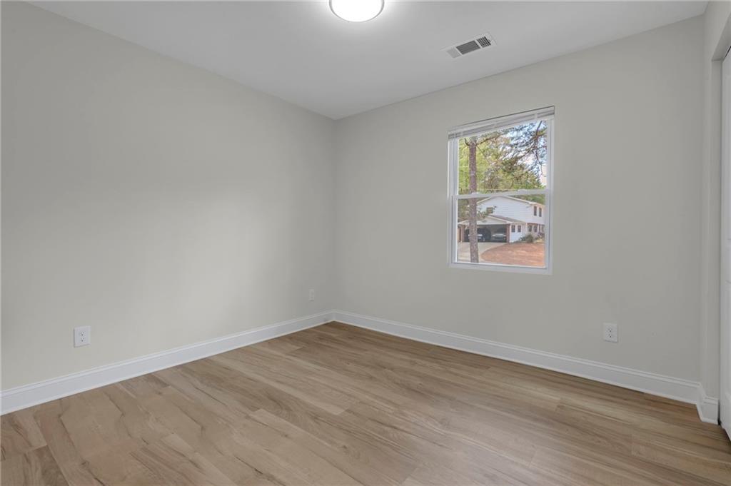 6788 Collier Way Riverdale, GA 30296 - Photo 15 of 37 an empty room with a window