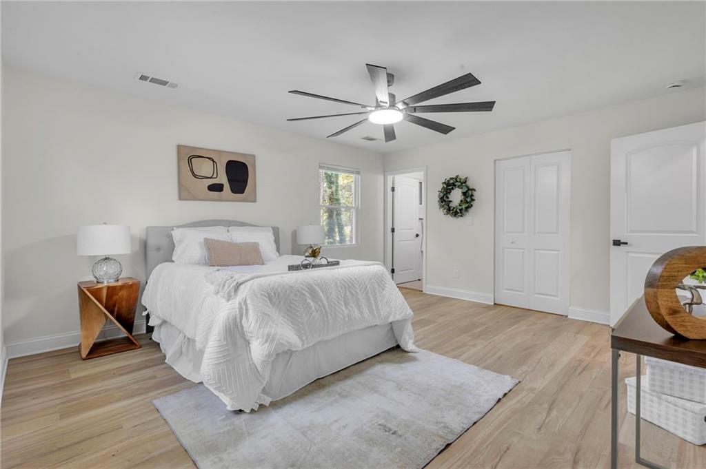 6788 Collier Way Riverdale, GA 30296 - Photo 19 of 37 a bedroom with a bed and a window