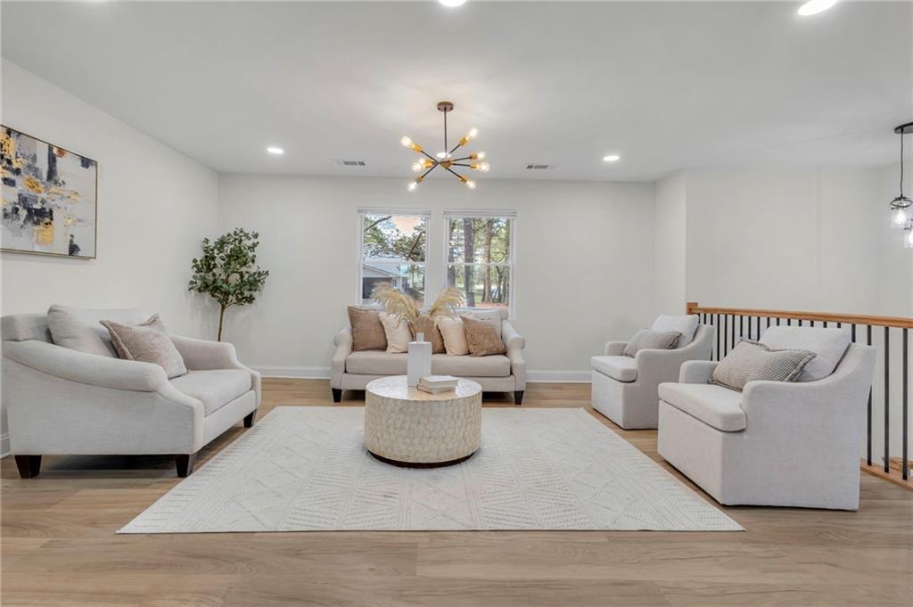 6788 Collier Way Riverdale, GA 30296 - Photo 4 of 37 a living room with furniture