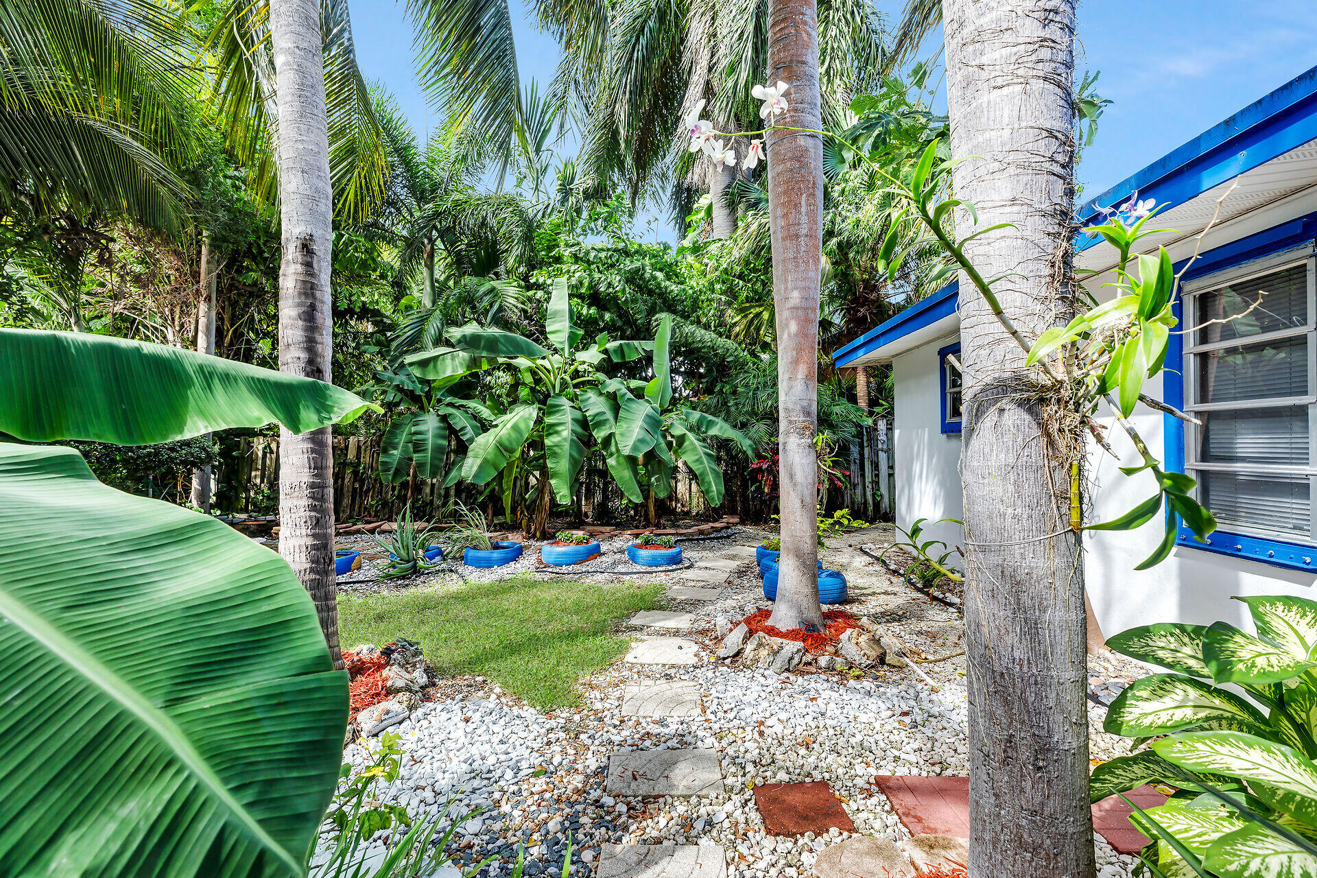13 Bass Avenue Key Largo, FL 33037 - Photo 33 of 43 a view of a park with potted plants and palm trees