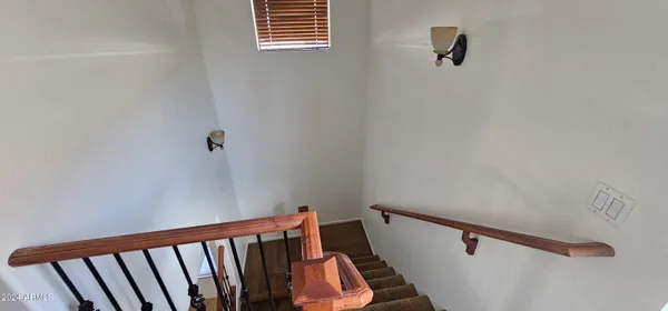 a view of balcony with furniture