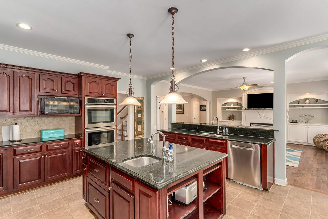 12419 Canolder Street Raleigh, NC 27614 - Photo 9 of 29 From the appliances to the granite countertops...it's a beauty from any angle. Kitchen