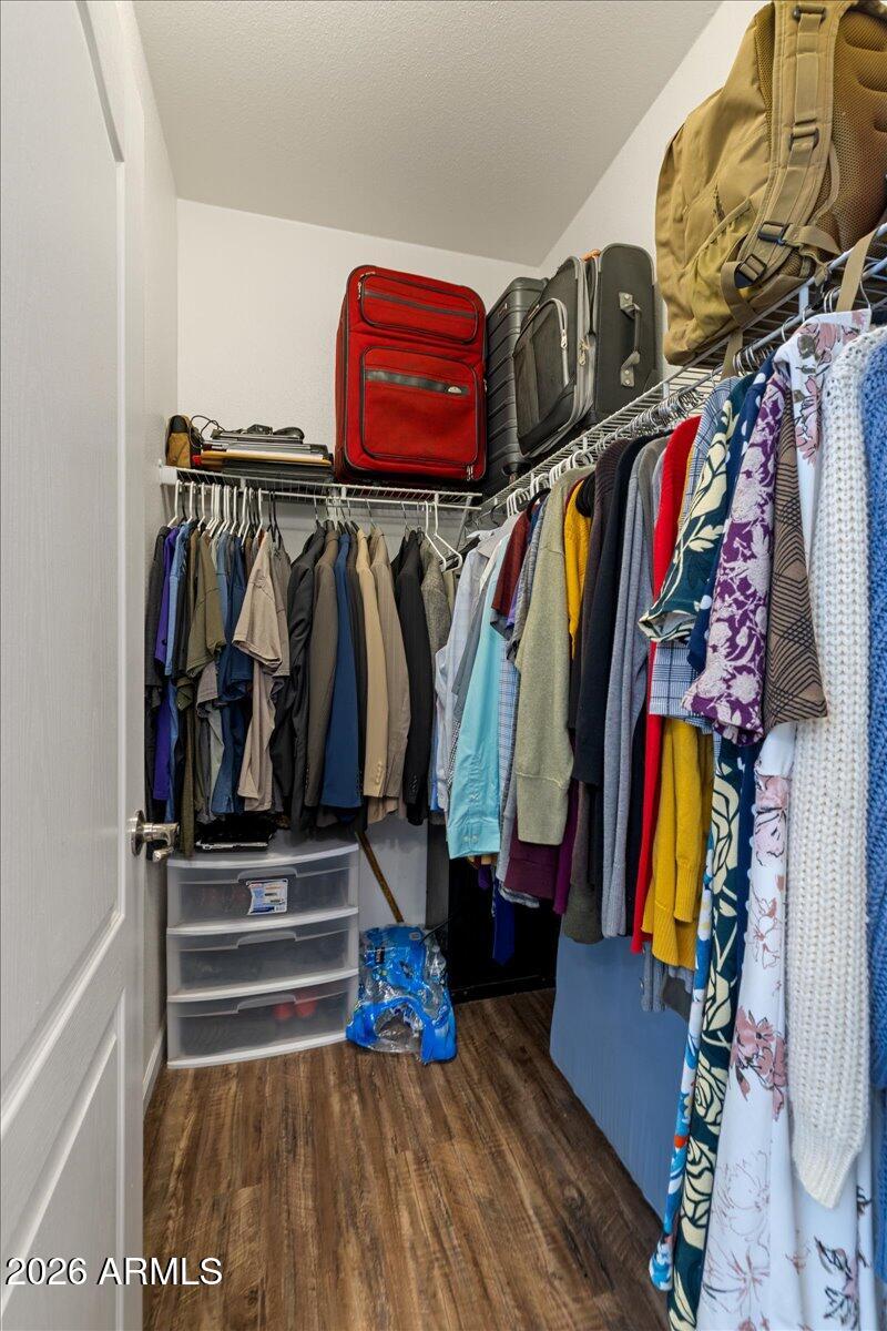 3107 West Country Quail Trail Paulden, AZ 86334 - Photo 16 of 47 a view of walk in closet with clothes and shoes