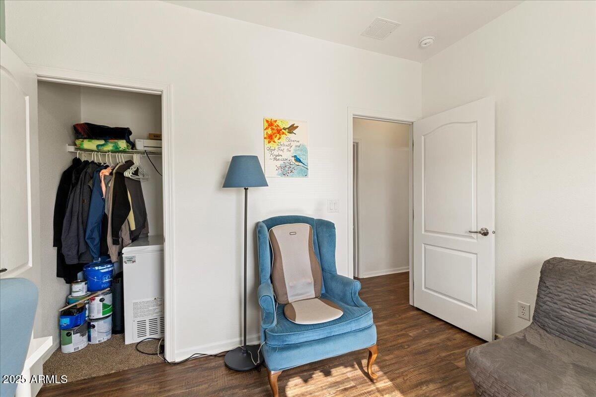 3107 West Country Quail Trail Paulden, AZ 86334 - Photo 23 of 47 a room with gym equipment and wooden floor