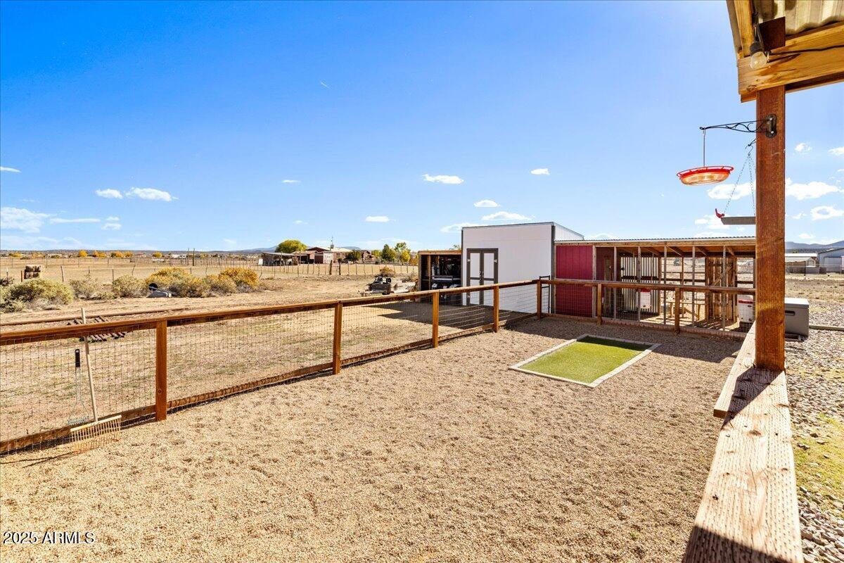 3107 West Country Quail Trail Paulden, AZ 86334 - Photo 36 of 47 a view of a swimming pool and an outdoor space