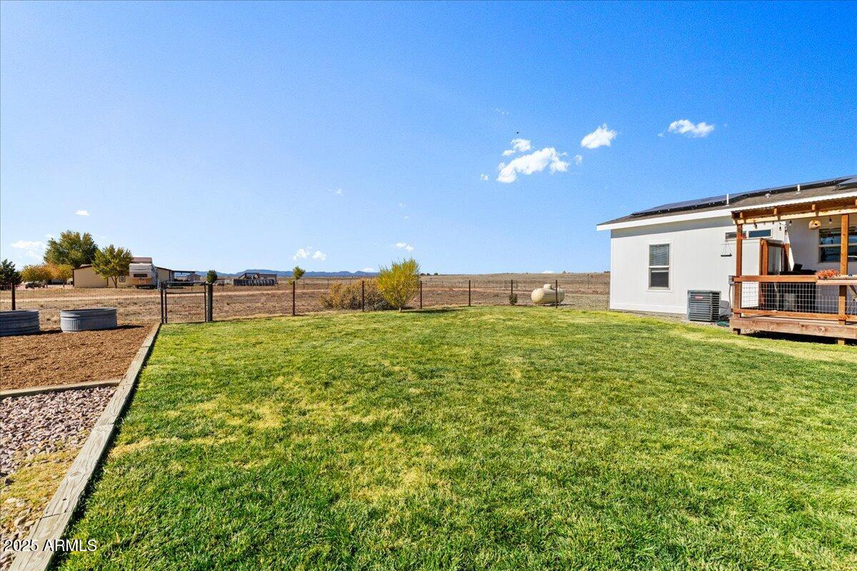 3107 West Country Quail Trail Paulden, AZ 86334 - Photo 37 of 47 a view of a house with backyard and a garden
