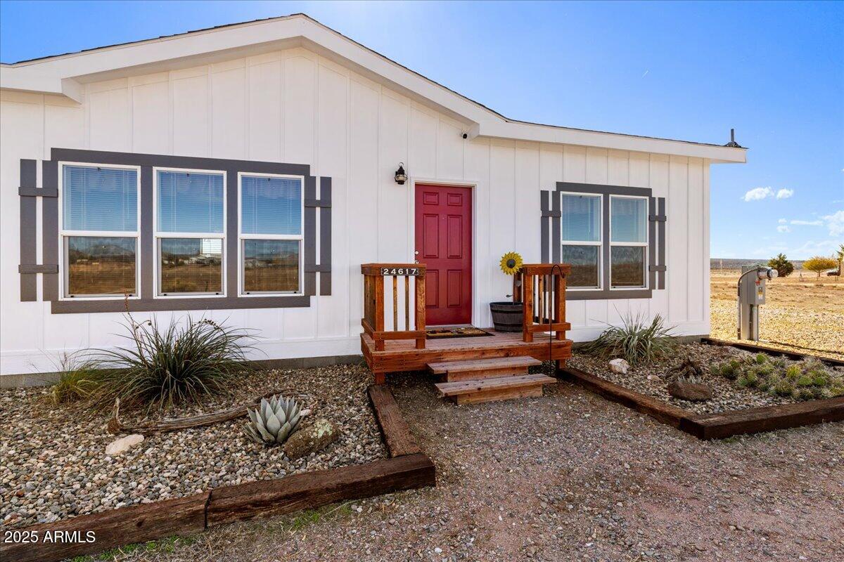 3107 West Country Quail Trail Paulden, AZ 86334 - Photo 4 of 46 a front view of a house with a couch