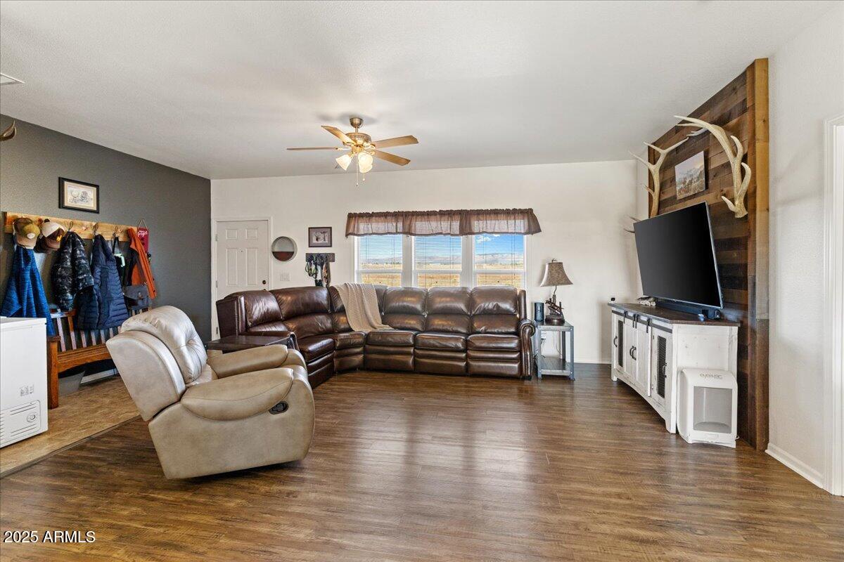 3107 West Country Quail Trail Paulden, AZ 86334 - Photo 9 of 46 a living room with furniture and a flat screen tv