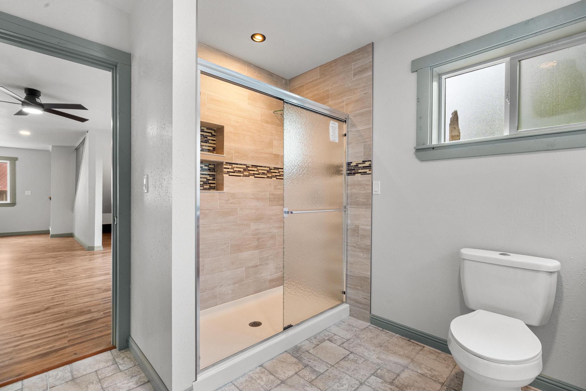 89-811 Huanui Road Captain Cook, HI 96704 - Photo 23 of 30 a bathroom with a toilet and a shower