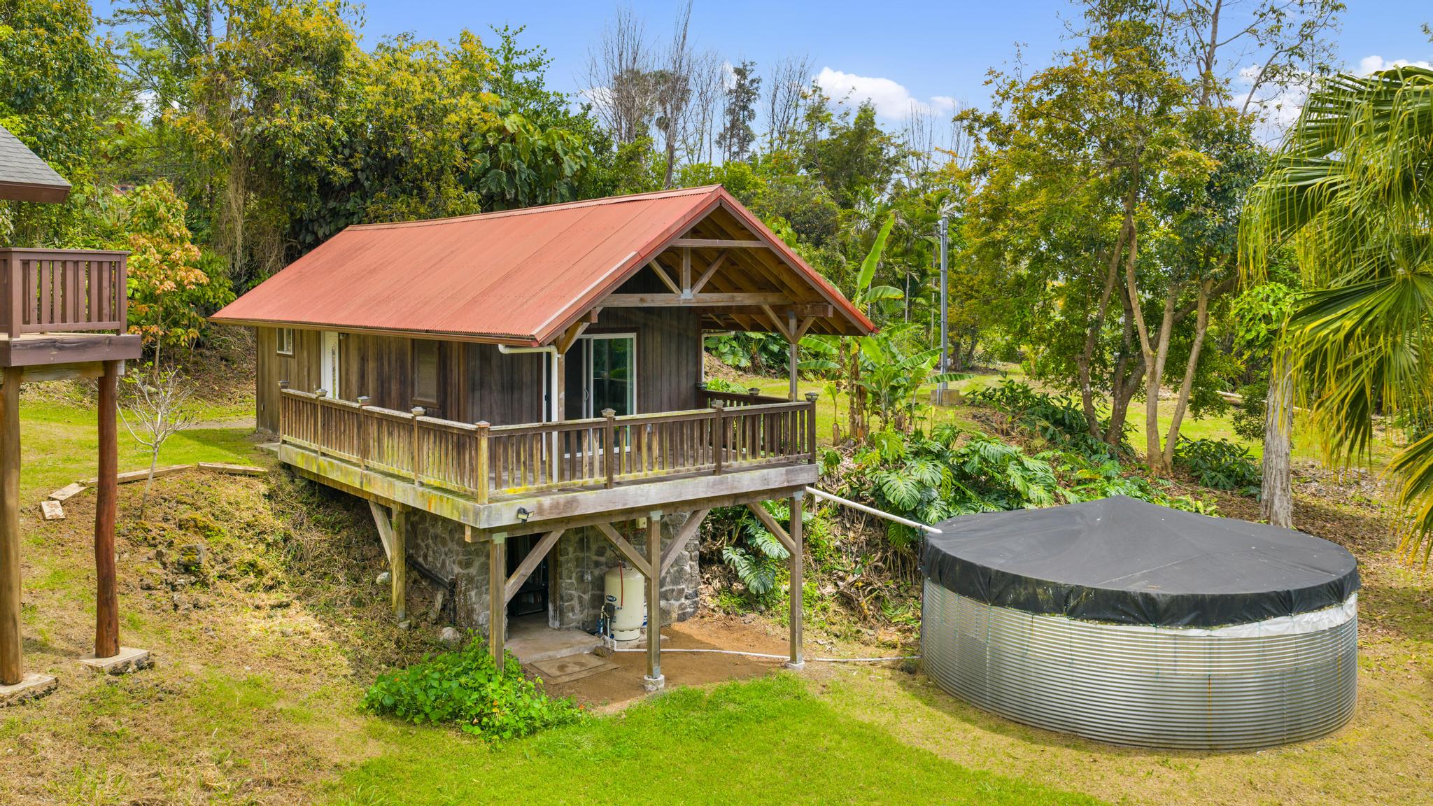 89-811 Huanui Road Captain Cook, HI 96704 - Photo 5 of 30 a house view with a garden space