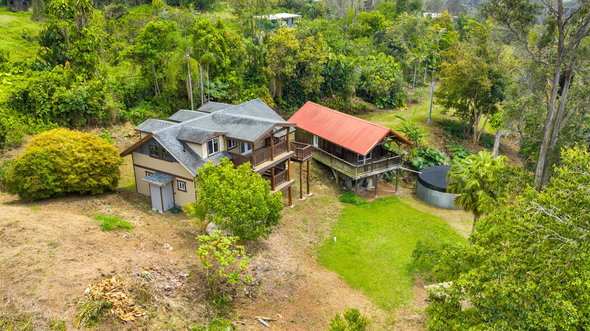 89-811 Huanui Road Captain Cook, HI 96704 - Photo 7 of 30 an aerial view of a house with a yard basket ball court and outdoor seating