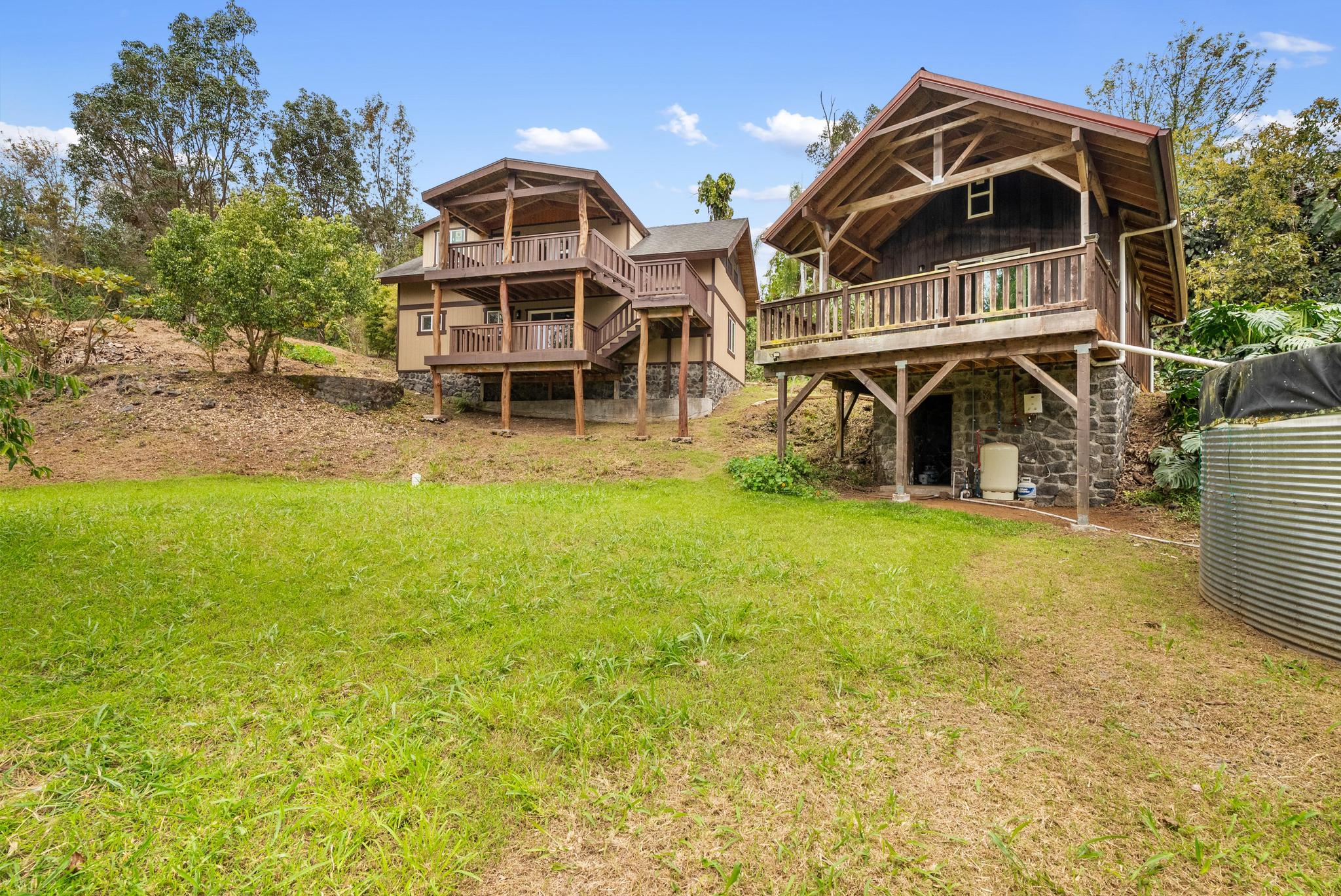 89-811 Huanui Road Captain Cook, HI 96704 - Photo 9 of 30 a view of a big yard in front of house