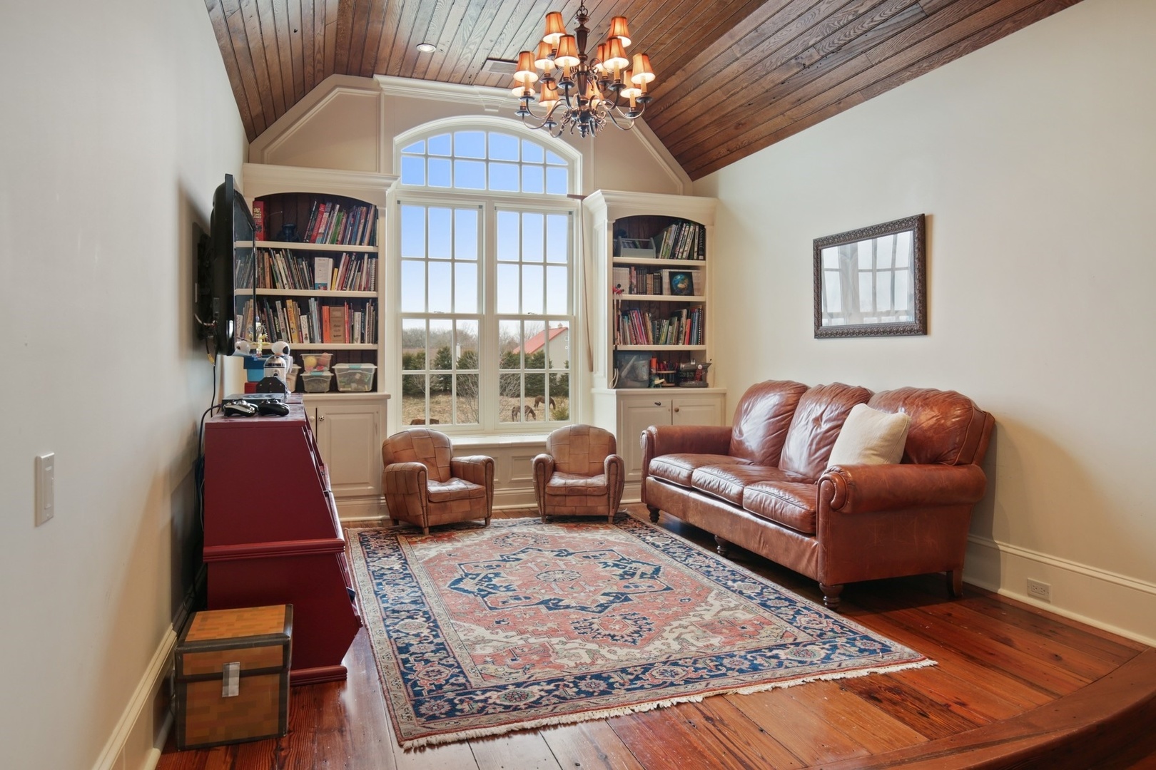 9N655 Kendall Road Elgin, IL 60124 - Photo 12 of 43 a living room with furniture hard wood floor and a rug