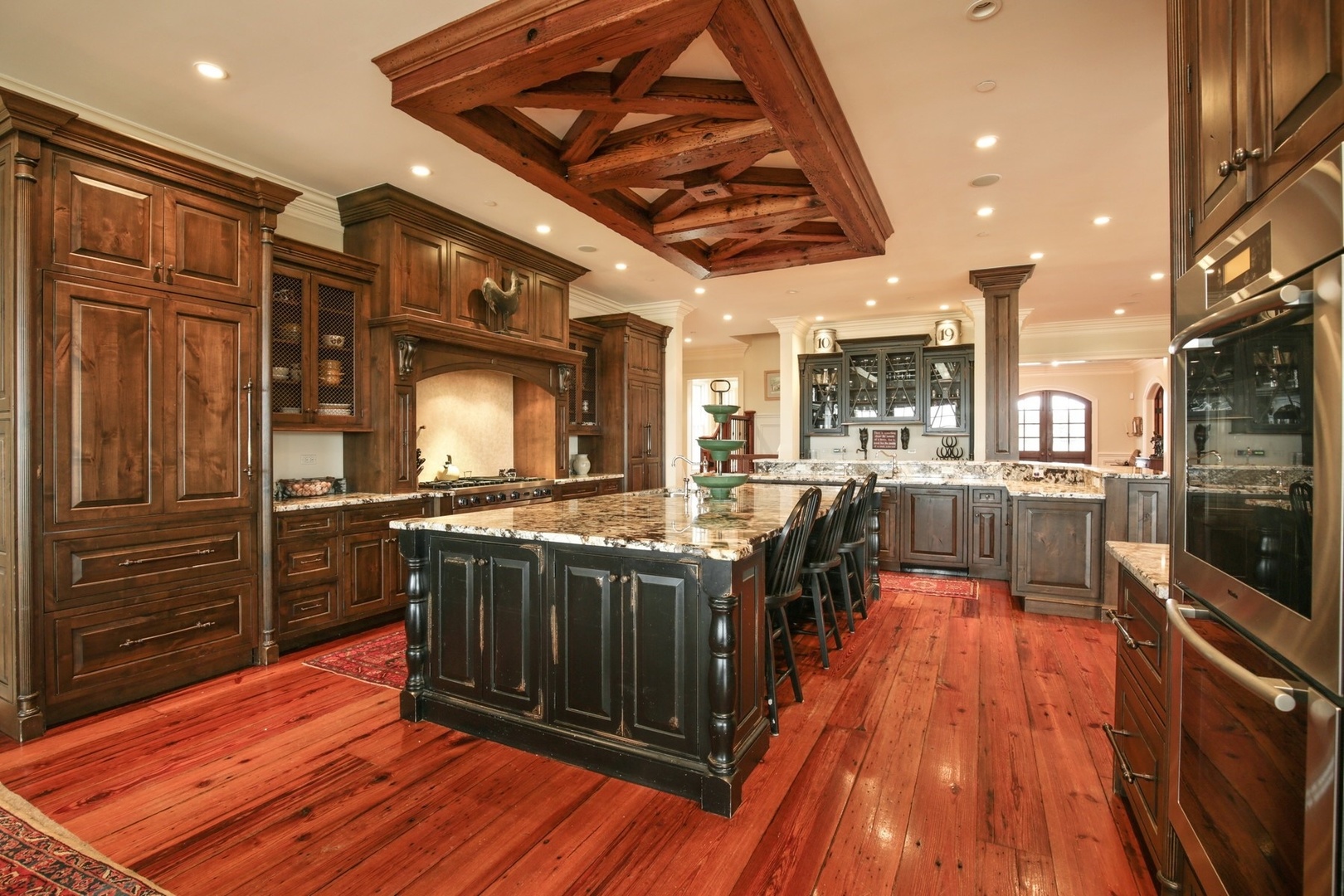 9N655 Kendall Road Elgin, IL 60124 - Photo 5 of 43 a kitchen with stainless steel appliances granite countertop a stove and a wooden floors