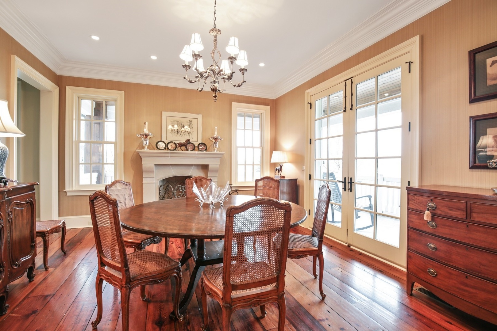 9N655 Kendall Road Elgin, IL 60124 - Photo 6 of 43 a view of a dining room with furniture a chandelier and wooden floor