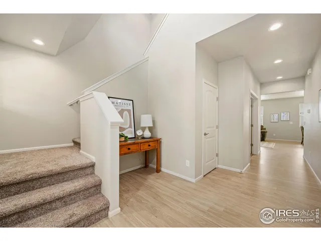 a view of a livingroom with furniture and wooden floor