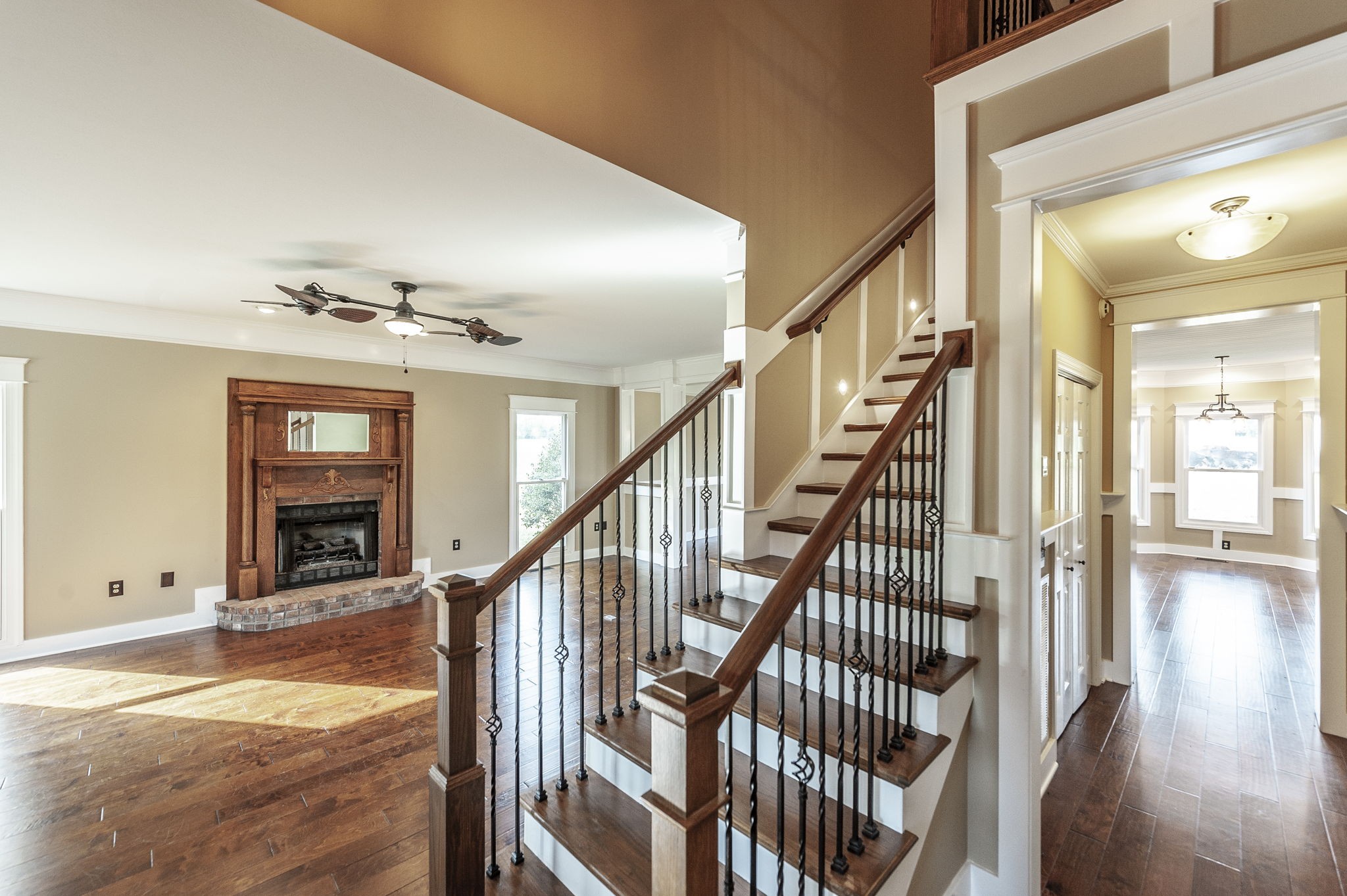 724 Deshea Creek Road Gallatin, TN 37066 - Photo 14 of 76 a view of staircase with wooden floor and a chandelier