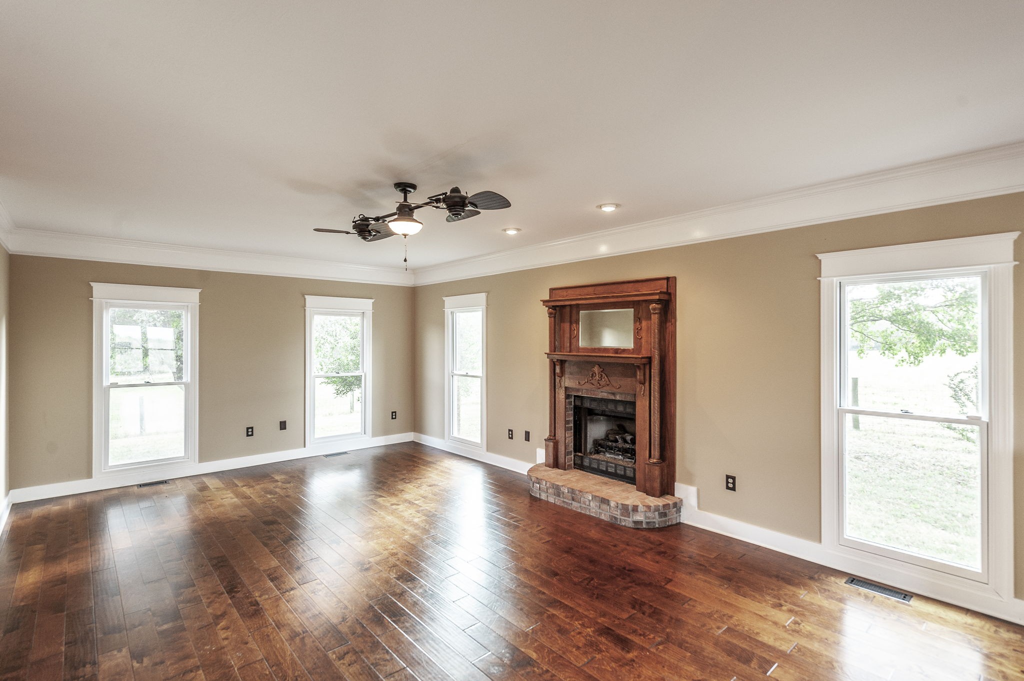 724 Deshea Creek Road Gallatin, TN 37066 - Photo 18 of 76 a view of an empty room with a window and wooden floor
