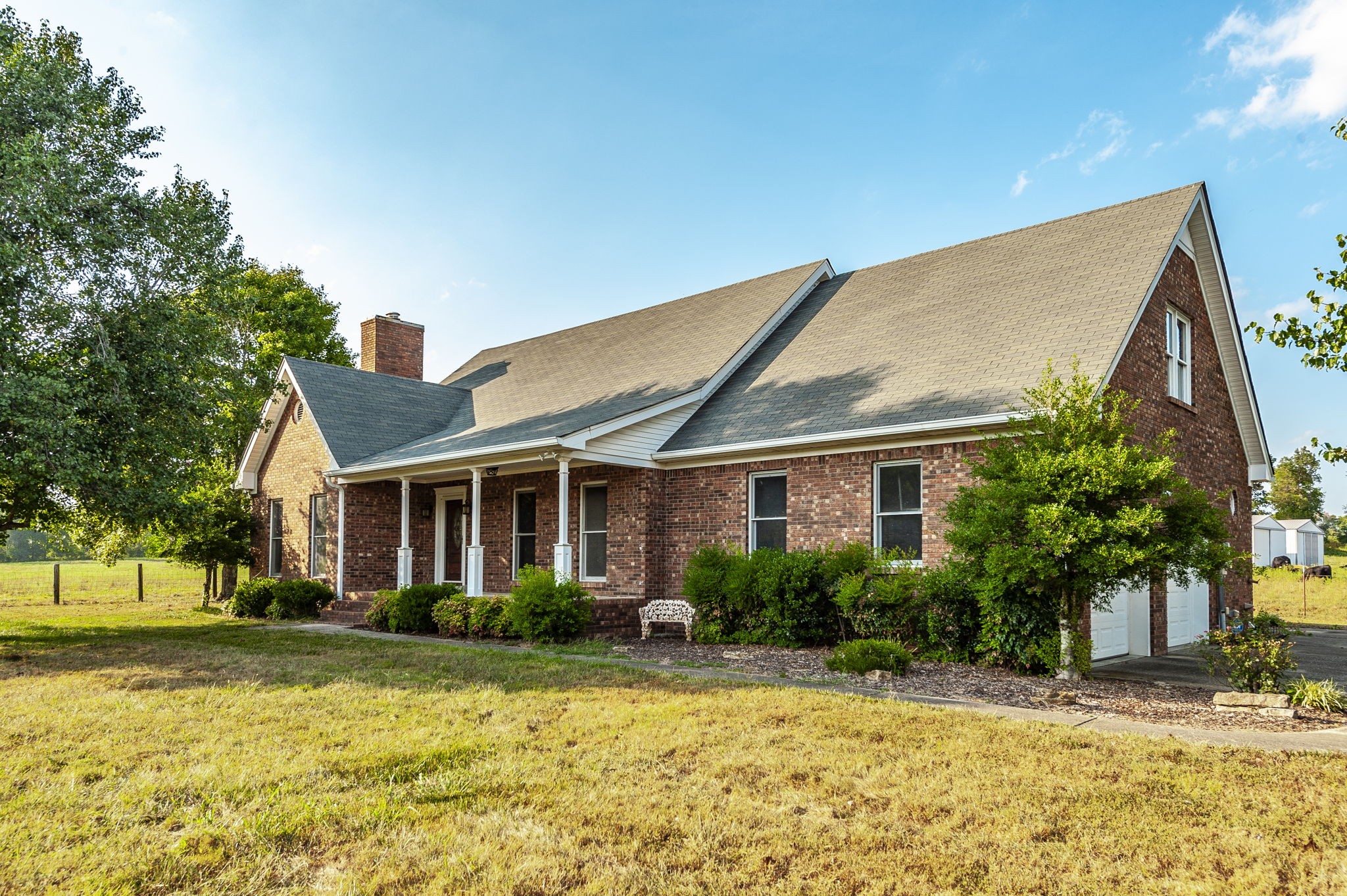 724 Deshea Creek Road Gallatin, TN 37066 - Photo 2 of 76 a front view of house with yard and trees around