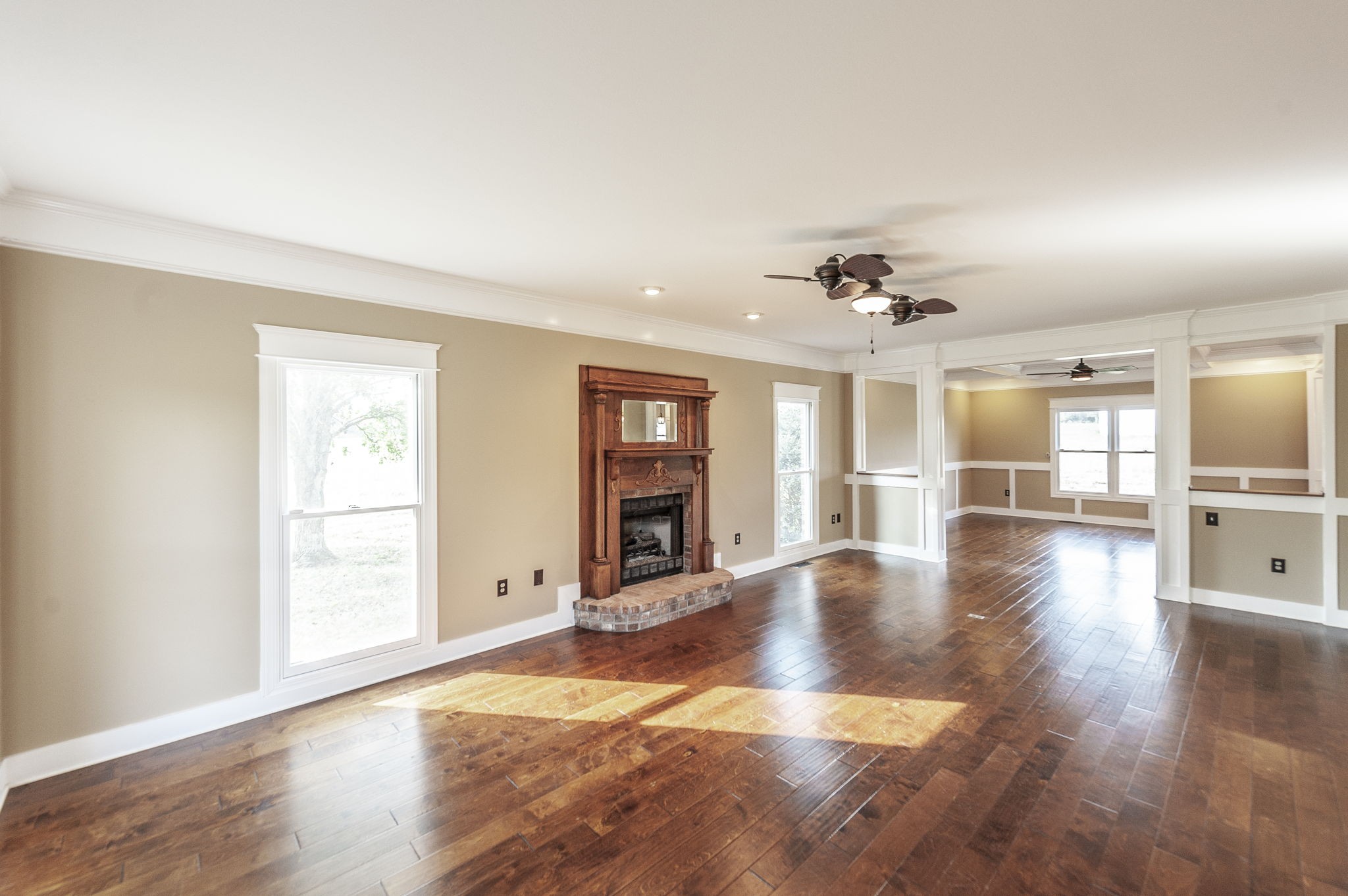 724 Deshea Creek Road Gallatin, TN 37066 - Photo 22 of 76 a view of an empty room with wooden floor and a window