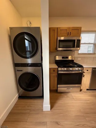 a kitchen with a stove and a microwave