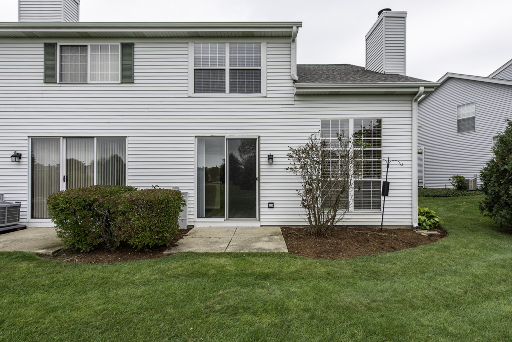 17876 Braewick Road Gurnee, IL 60031 - Photo 25 of 28 a house view with a garden space