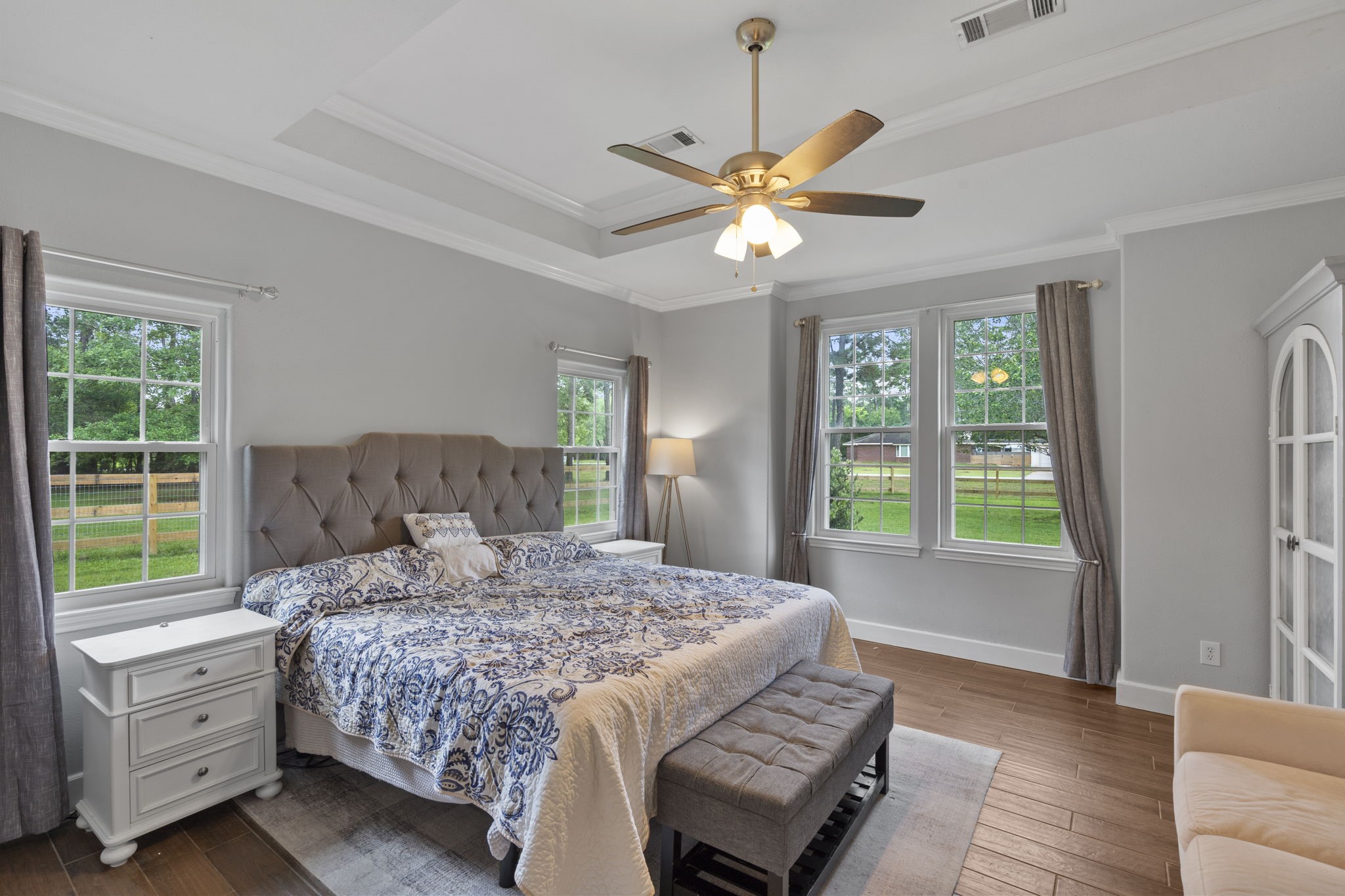 23200 Baneberry Road Magnolia, TX 77355 - Photo 21 of 39 a bedroom with a large bed and a window