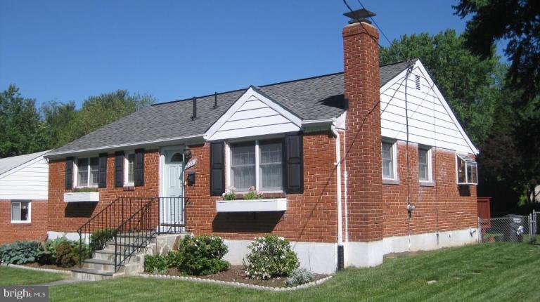 3109 Weller Road Silver Spring, MD 20906 - Photo 1 of 20 a front view of a house with a yard