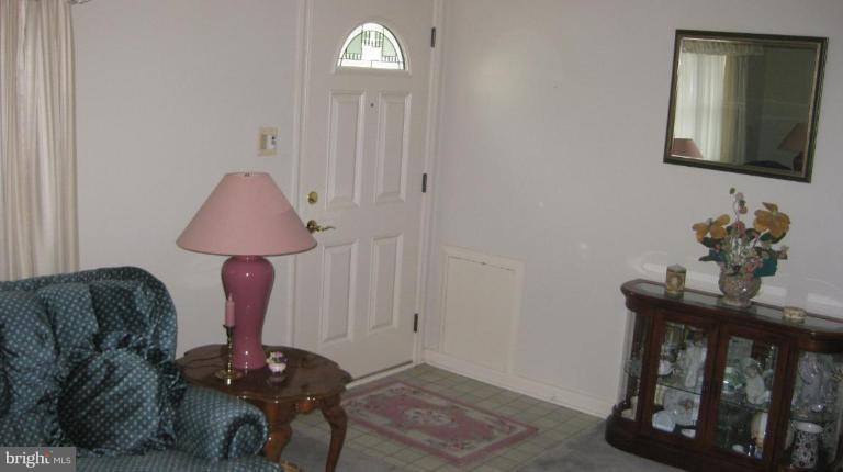 3109 Weller Road Silver Spring, MD 20906 - Photo 14 of 20 a living room with furniture and a window