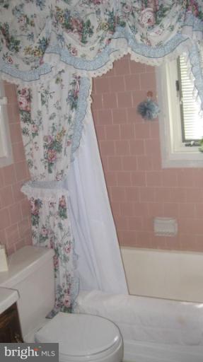 3109 Weller Road Silver Spring, MD 20906 - Photo 6 of 20 a bathroom with a toilet and a shower