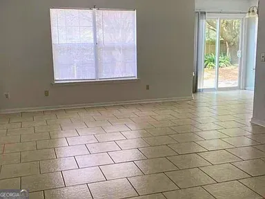 en empty room with a window