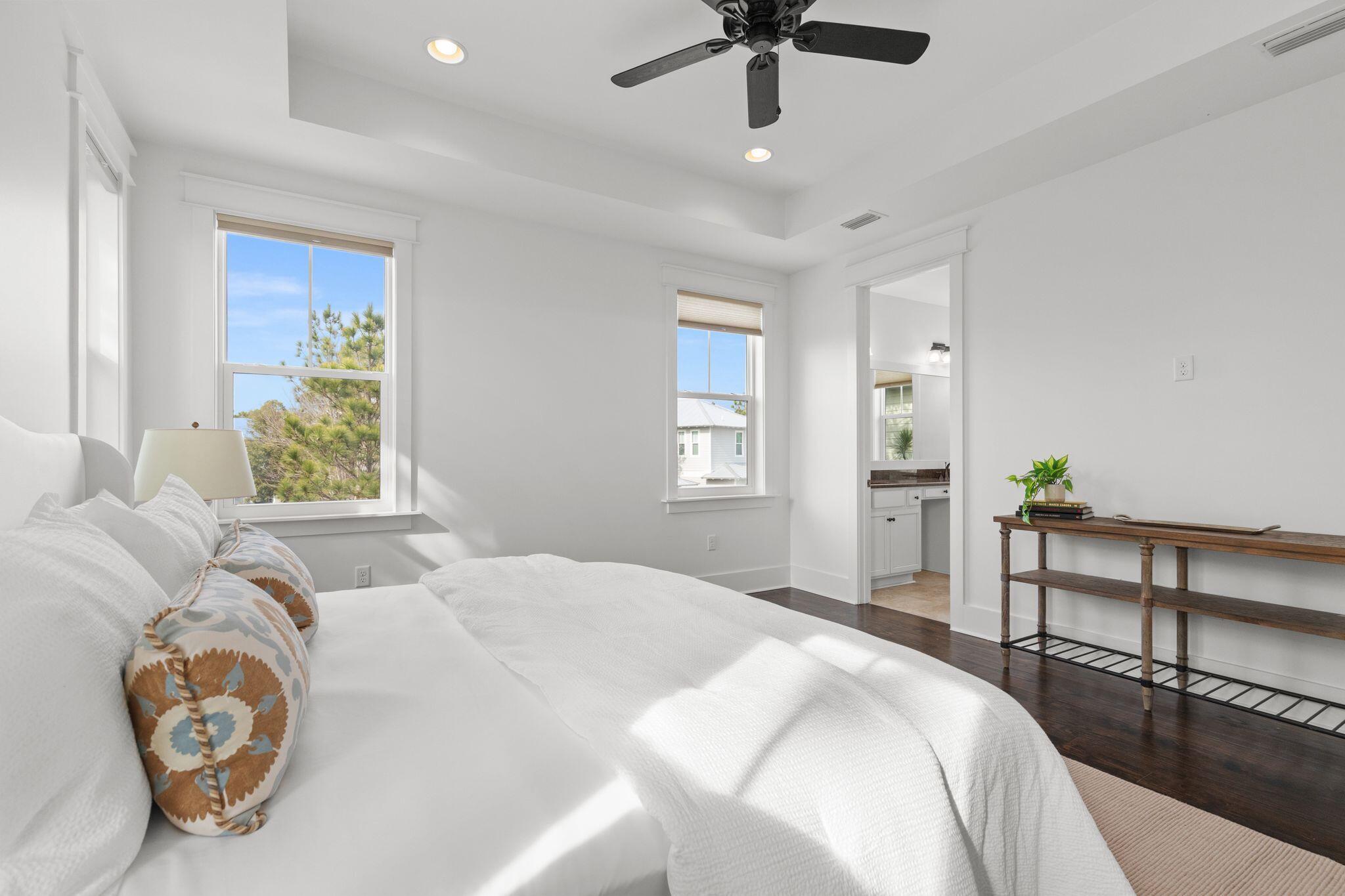 694 Flatwoods Forest Loop Santa Rosa Beach, FL 32459 - Photo 19 of 54 a bedroom with a bed and a window