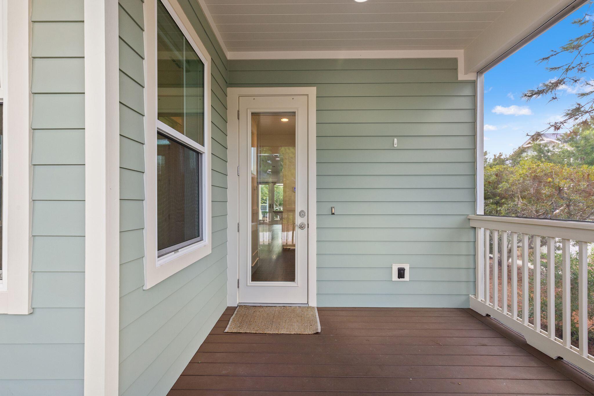 694 Flatwoods Forest Loop Santa Rosa Beach, FL 32459 - Photo 31 of 54 a view of front door and porch