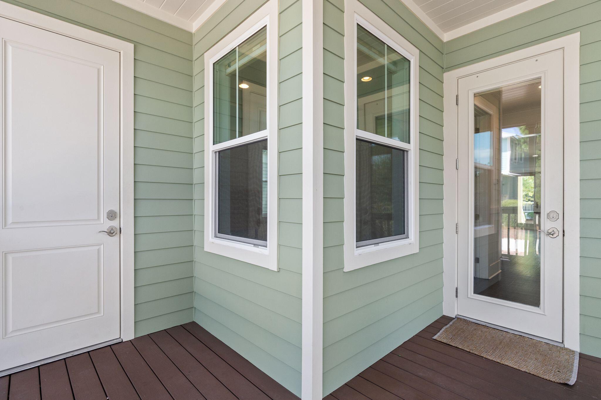 694 Flatwoods Forest Loop Santa Rosa Beach, FL 32459 - Photo 32 of 54 a view of front door of a house
